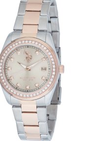 Orologio argento e oro rosa con quadrante rotondo in metallo, accents in cristallo scintillante e cinturino a maglie. Presenta una finestrella per la data e il logo.