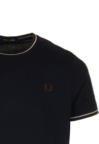 Marinefarbener Rundhalsausschnitt T-Shirt aus Baumwolle mit kontrastierendem Rippkragen. Verfügt über ein kleines braunes Lorbeer-Logo auf der Brust.