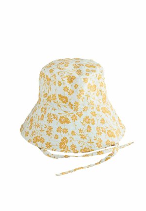 White bucket hat with yellow floral print and adjustable tie straps at the back, suited for sun protection and casual wear.