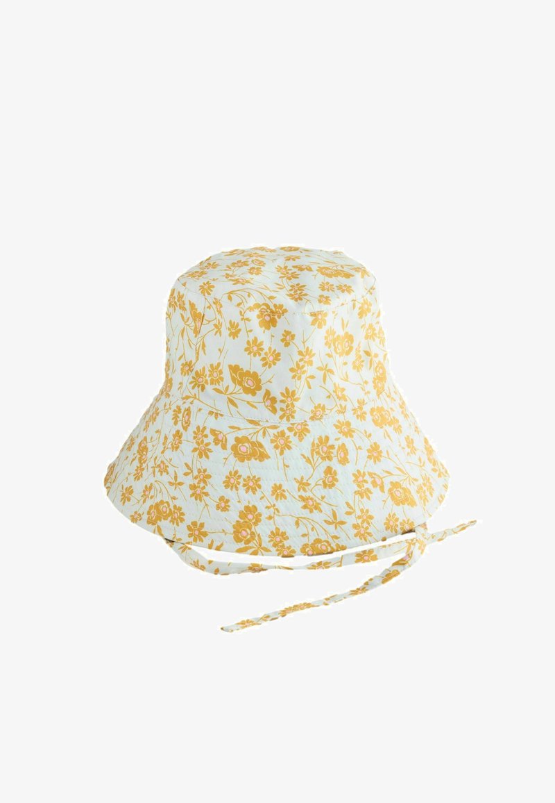 Chapeau bob blanc avec imprimé floral jaune et sangles ajustables à l'arrière, idéal pour la protection solaire et un port décontracté.