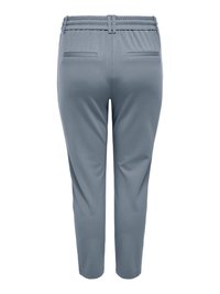 Light blue, stretchy pants with a textured waistband, two back pockets, and a tapered leg design. Smooth fabric with no visible fasteners.