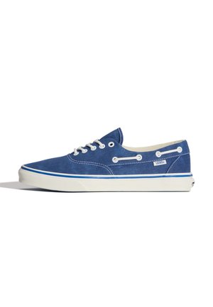 Blue suede Vans lace-up sneaker with white rubber sole and blue stripe detail, side eyelets, and Vans logo tag.