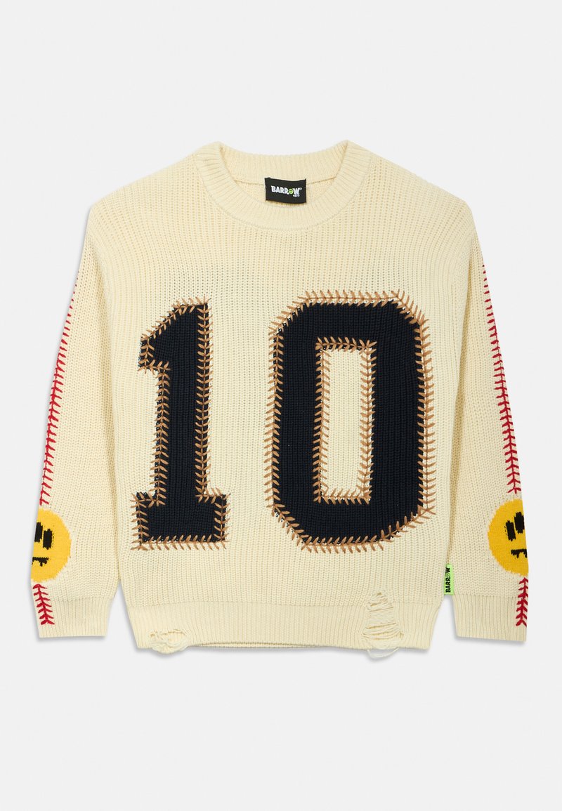 Sweater tricotado na cor creme apresentando um grande número "10" azul-marinho, detalhes em costura de beisebol e uma cara sorridente amarela na manga. Acentos desgastados notáveis.