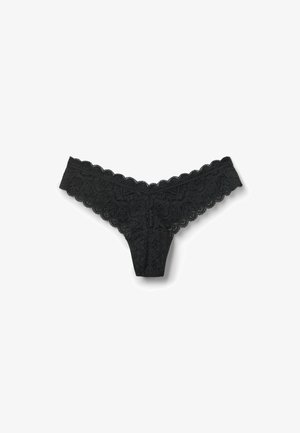 Schwarzer Spitzen-Tanga mit floralen Mustern, gewellten Kanten und einer leichten, durchsichtigen Textur. Minimaler Bedeckungsgrad.