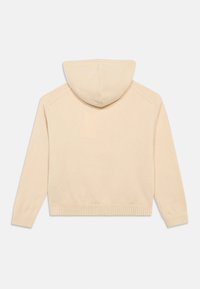 Φωτεινό μπεζ φούτερ με κουκούλα, πλεκτή υφή, ριμπ μανσέτες και στρίφωμα, διαθέτει αδιάσπαστο σχέδιο με μαλακή, άνετη φινέτσα.