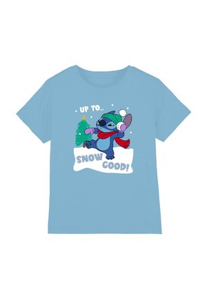 Light blue cotton T-shirt featuring a graphic of a cartoon character with ear muffs and a scarf, surrounded by holiday-themed text and imagery.