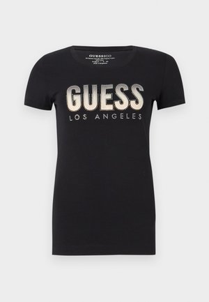 Zwarte katoenen t-shirt met ronde halslijn en korte mouwen, met een glinsterend "GUESS LOS ANGELES" logo in een metallic afwerking.