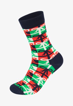 Flerfargede bomullsstømper med et rutemønster i rødt, grønt og hvitt med sløyfedesign, samt en mørk marineblå ribbestrikket mansjett på toppen.