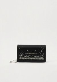 Black clutch bag featuring rhinestone embellishments, a logo, and a silver chain strap. The texture is smooth, with a structured design.