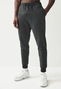 Next JOGGERS REGULAR FIT - Treniņtērpa apakšdaļas - slate grey