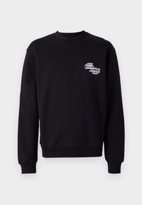 Sweatshirt preto com design de gola redonda, apresentando um logótipo branco no lado esquerdo do peito. Feito de um tecido suave em mistura de algodão com punhos canelados.