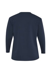 Námořnická košile s dlouhým rukávem, vyrobená z měkké bavlněné směsi. Má kulatý výstřih, volný střih a hladkou strukturu bez výrazných vzorů nebo akcentů.