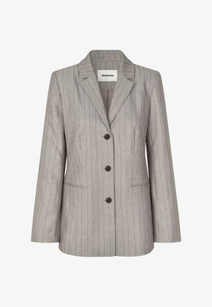 Hallinhallus, millel on kitsas triiburibad, nurgalapelt ja kolm esist nuppu ning kaks küljetaskut. Valmistatud tekstureeritud kangast, sobib hästi selga.