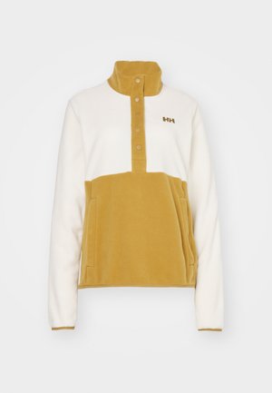 Fleece-Pullover in Weiß und Senfgelb, mit einer viertellangen Knopfleiste, zwei Fronttaschen und hohem Kragen. Mit Logo auf der Brust.