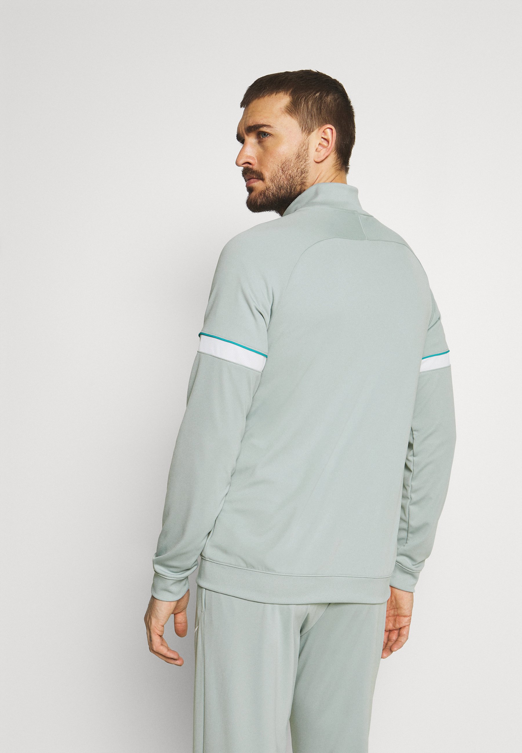 Nike Performance ACADEMY SUIT - Chándal - light pumice/white/gris claro -  Zalando.es