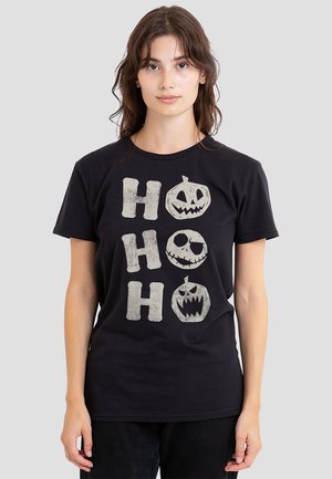 Black cotton t-shirt featuring a graphic design with the letters "H O H O" and three stylized pumpkin faces in white and grey.