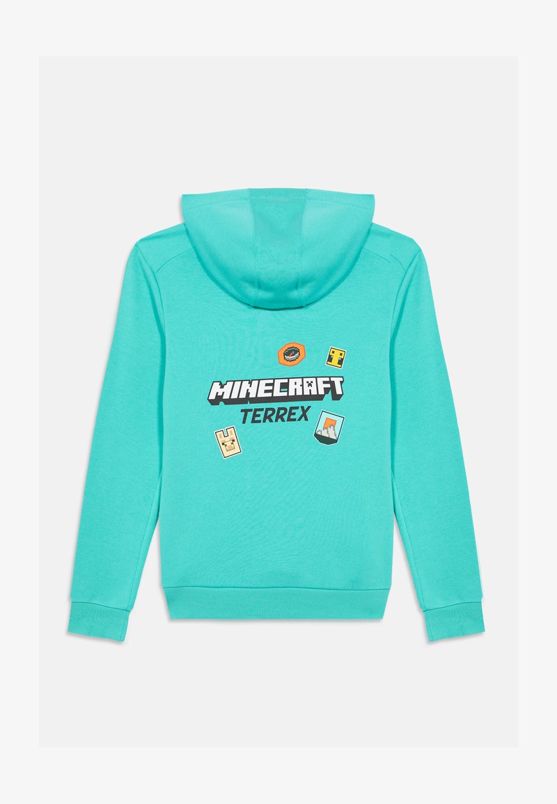 Un sweat à capuche turquoise avec le logo Terrex de Minecraft et quatre écussons de style pixel inspirés des jeux au dos, présenté à plat avec la capuche levée.