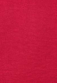 Textured fabric in a vibrant red color, featuring a tight weave pattern and uniform surface, ideal for various textile applications.