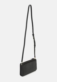 Black leather crossbody bag, rectangular shape, textured surface, adjustable strap, silver hardware, featuring a zippered main compartment.