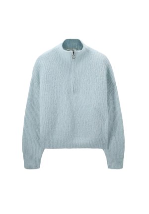 Pull en maille douce de couleur bleu clair avec des manches longues et une courte fermeture éclair avec une tirette ronde au col haut.