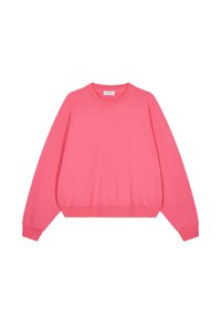 Ružová mikina s okrúhlym výstrihom, spustenými ramenami, rebrovanými manžetami a lemom. Mäkká textúra s jemným logom na prednej strane.