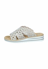 Flat slide sandal featuring a laser-cut white synthetic upper with rhinestone accents, a natural cork footbed, and a dual-tone rubber sole.