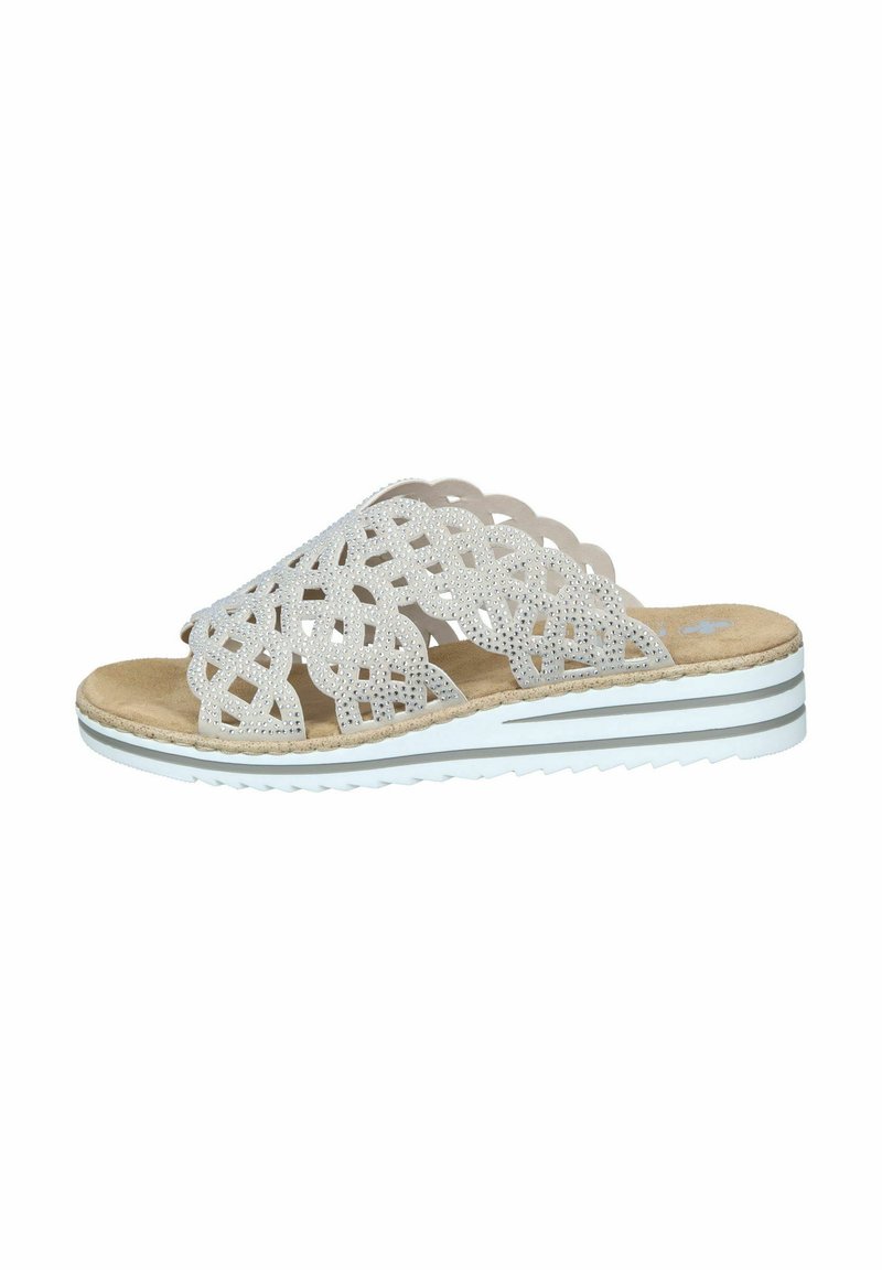 Flat slide sandal featuring a laser-cut white synthetic upper with rhinestone accents, a natural cork footbed, and a dual-tone rubber sole.