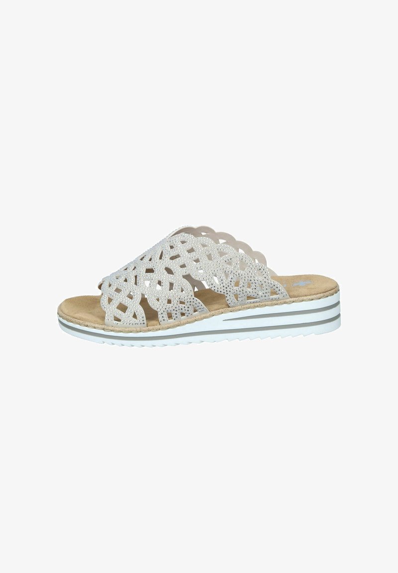 Flat slide sandal featuring a laser-cut white synthetic upper with rhinestone accents, a natural cork footbed, and a dual-tone rubber sole.