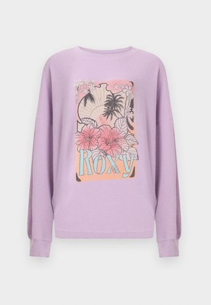 Lavendelfarbenes Langarmhemd mit tropischem Blumen- und Palmenmuster, das Wort "ROXY" in Blau- und Pinktönen in der vorderen Mitte.