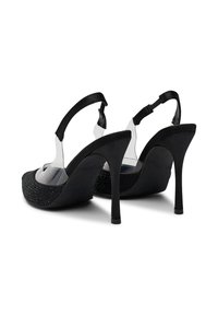 Sandale negre cu toc înalt, cu finisaj din suede, curele superioare transparente, vârfuri texturate și toc subțire stiletto. Detalii strălucitoare Notabile.