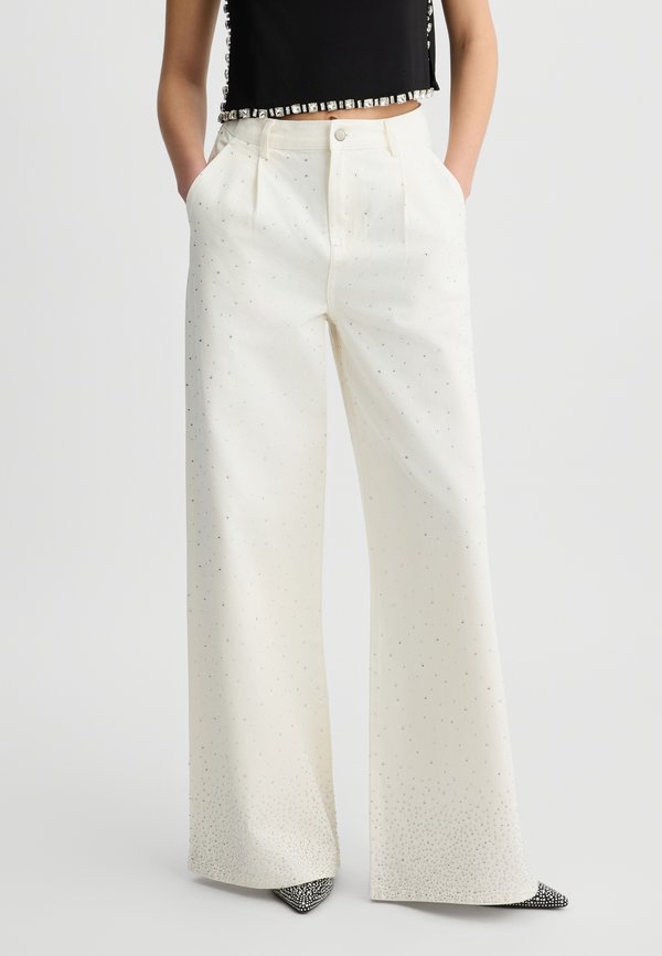 WITH RHINESTONES - Flared Jeans