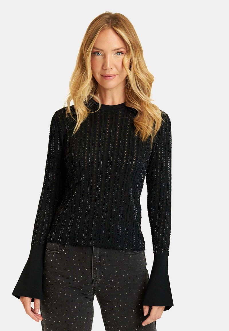 Czarny długi rękaw dzianinowy top z pionowymi paskami i teksturowanym wzorem, z dzwonowymi mankietami i okrągłym dekoltem.