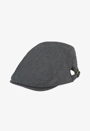 Gorra de lana gris con forma redondeada, que presenta unipa elegante visera curva y un pequeño detalle de hebilla de latón en el lateral. Textura suave y diseño minimalista.