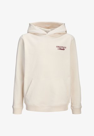 Jopa kremne barve s sprednjim žepom in kapuco, z rdečim napisom "Originals Studio" na levi strani prsnega koša.