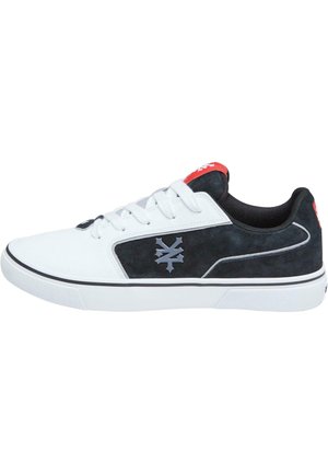 White athletic shoe with black suede accents, gray logo, and red heel tab. Features a classic lace-up design and textured rubber sole.