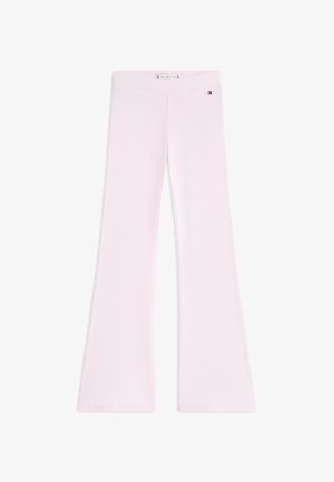 Pantaloni a zampa a coste di maglia rosa chiaro con vita alta e piccolo logo Tommy Hilfiger sull'anca sinistra superiore.