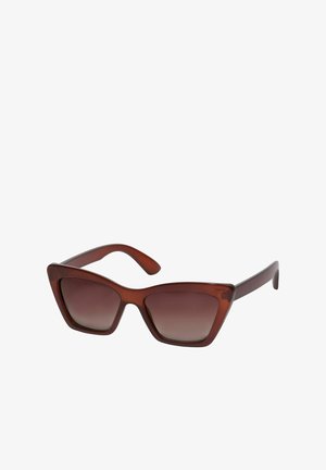 Prunad prillid, millel on gradient objektiiv, paks plastraam ja sile pind. Omab kõveraid käsi kindla sobivuse tagamiseks.