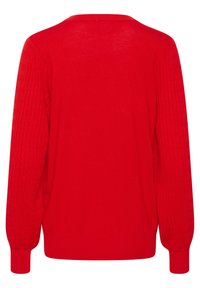 Pull rouge avec un corps lisse et des manches à côtes texturées. Col rond et poignets ajustés. Design simple et uni sans ornements.