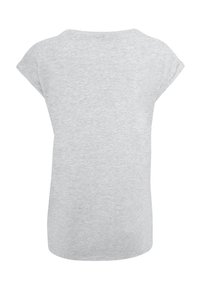 Gray short-sleeve t-shirt made of soft fabric, featuring a rounded neckline and relaxed fit, with rolled sleeves and a smooth texture.