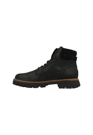 Bottines en cuir noir avec des accents en daim texturé, bout rond, design à lacets, et semelle en caoutchouc robuste avec un entrebattement beige.