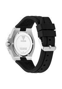 Orologio con cinturino in silicone nero e cassa in acciaio inossidabile, retro impermeabile e dettagli testurizzati sul cinturino. Presenta accenti argentati.