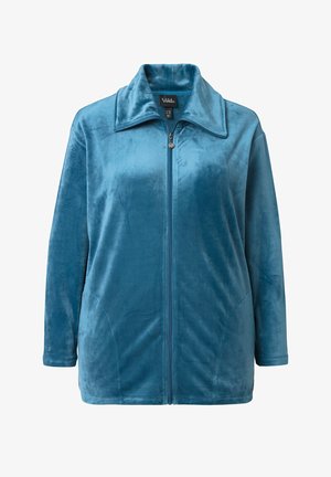 Veste zippée teal en matériau doux et pelucheux ; présente un col replié et des poches avant ; texture lisse avec une coupe décontractée.