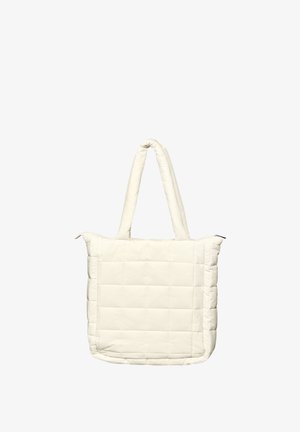 Quilted tote bag i off-white med polstret tekstur, rektangulær form, to skulderremme og en lynlåsafslutning øverst.
