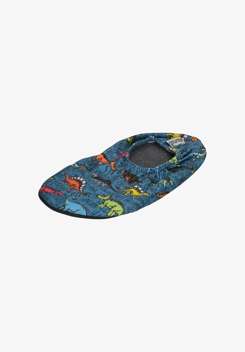 Blauer Stoffschuh mit einem Dinosaurier-Muster in verschiedenen Farben. Elastischer Kragen und graue Innenauskleidung, mit einer schwarzen Sohle.