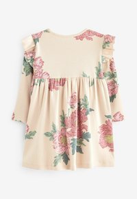Robe crème à manches longues pour tout-petit avec imprimé floral rose et vert et détails à volants aux épaules.