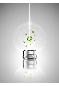 Silver jar with a rounded lid, labeled "DARPIN STIMULSKIN PLUS." Green orbs are visually emanating from it, amidst light lines on a gradient background.