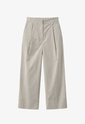 Beige wijduitlopende broek met hoge taille, voorplooien, zijzakken en een knoopsluiting aan de tailleband.