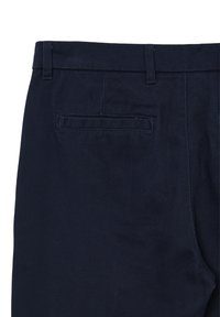 Marineblaue Hose aus strukturiertem Stoff, mit schlanker Silhouette und einer hinteren Tasche mit horizontalem Öffnung.