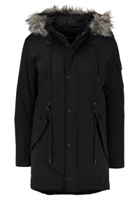 Svart parkas med fuskpäls i huvan, dragkedjeförsedda sidofickor, justerbara dragsko och tryckknappsstängning. Släta, hållbara väv.