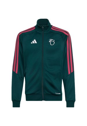 Σκούρο πράσινο αθλητικό μπουφάν Adidas με ροζ ρίγες στα μανίκια, πλήρες φερμουάρ μπροστά και λευκά λογότυπα στο στήθος και στο ύφασμα.